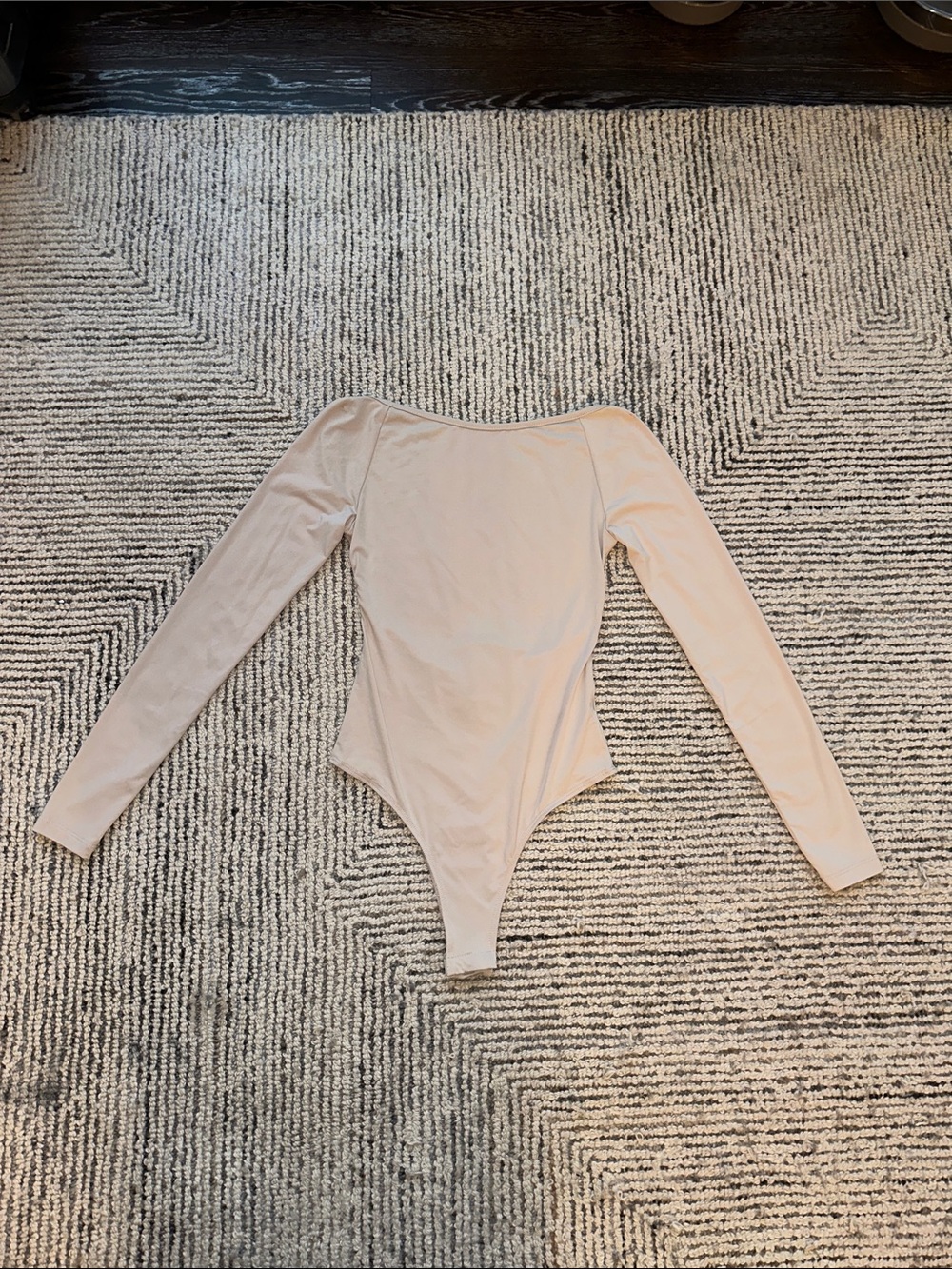 Long Sleeve Open Back One-Piece Bodysuit in Nude